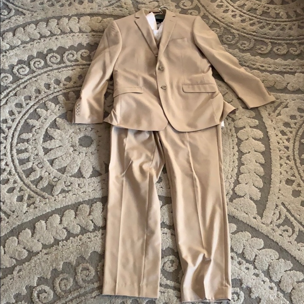 Men’s tan suit. Wore once